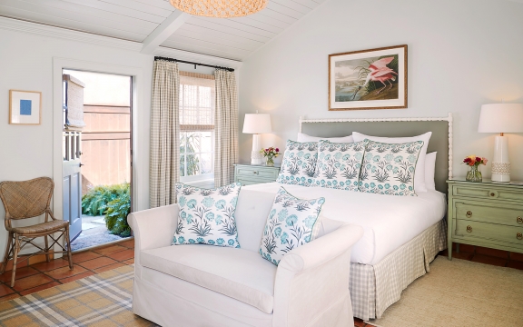 California king bed in the Premier Hot Tub Cottage.