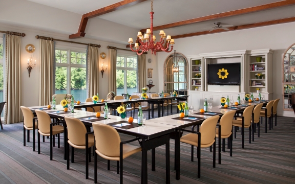 Treehouse Lake Room tables and chairs set up for group gathering
