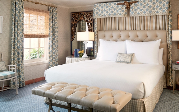 king bed in Lady Bird Suite at Lake Austin Spa Resort