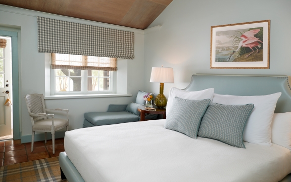 California King Bed with Chair, Lounger under window in Luxury Garden View Room