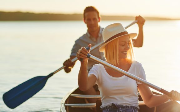 A couple paddling on the lake